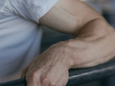Close up of a man hands gripping a barbell