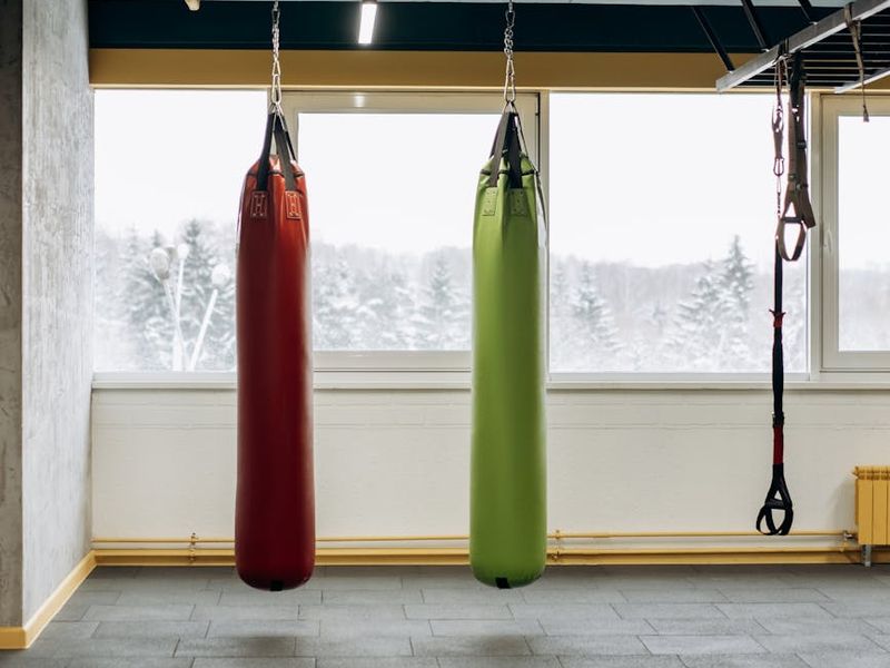 Interior of a modern dark gym with minimal lighting